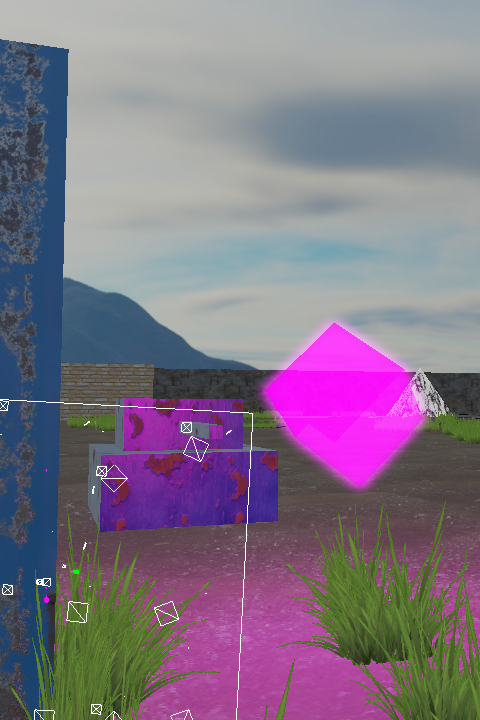 3D scéna s velkou růžovou poloprůhlednou střelou letící od hranatého tanku, cihlovým blokem v pozadí, zelenou trávou a vzdálenou horou.